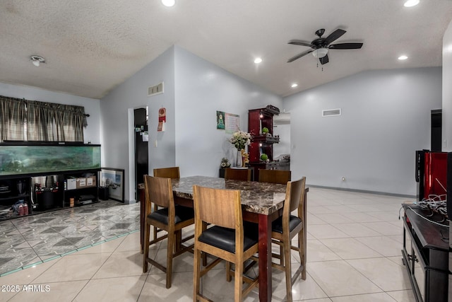 5432 W Sunnyside Dr, Glendale, AZ 85304 - dining space with vaulted ceiling, ceiling fan, light tile patterned flooring, and recessed lighting