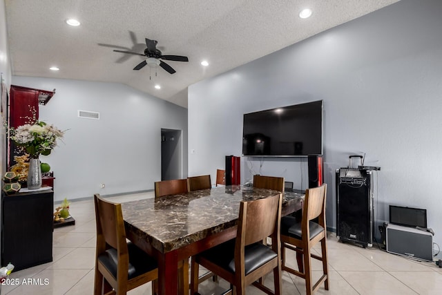 5432 W Sunnyside Dr, Glendale, AZ 85304 - dining room featuring a ceiling fan, light tile patterned flooring, vaulted ceiling, recessed lighting, and a textured ceiling
