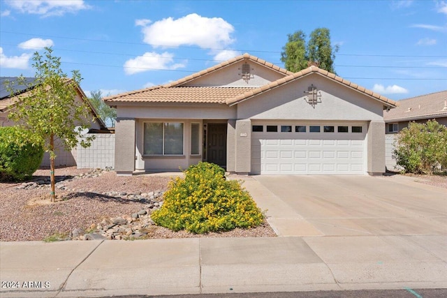 view of front of property with a garage