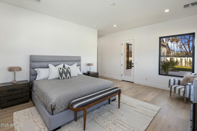 bedroom with light wood-type flooring