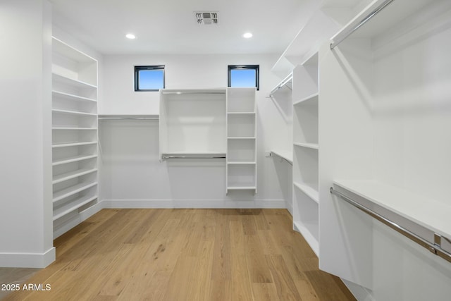 walk in closet featuring light wood-type flooring