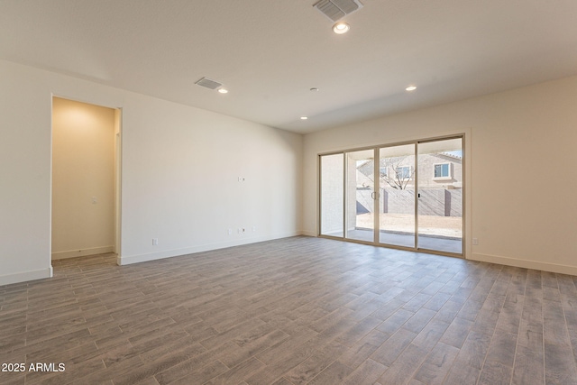 unfurnished room featuring wood-type flooring