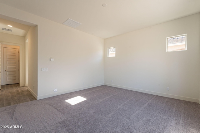 view of carpeted spare room