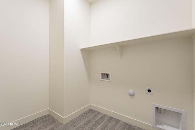 laundry area with washer hookup, hookup for a gas dryer, wood-type flooring, and electric dryer hookup