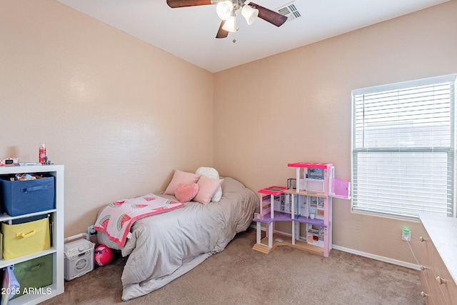 bedroom featuring carpet, visible vents, ceiling fan, and baseboards