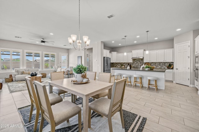 dining space with visible vents and recessed lighting