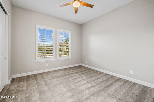 unfurnished bedroom with a closet, ceiling fan, baseboards, and carpet floors