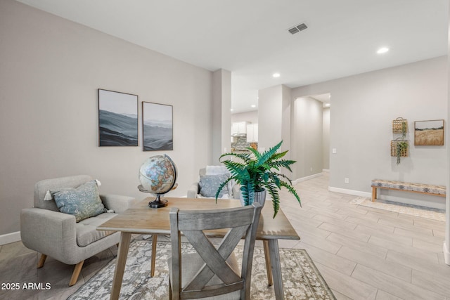 dining room with recessed lighting, visible vents, and baseboards