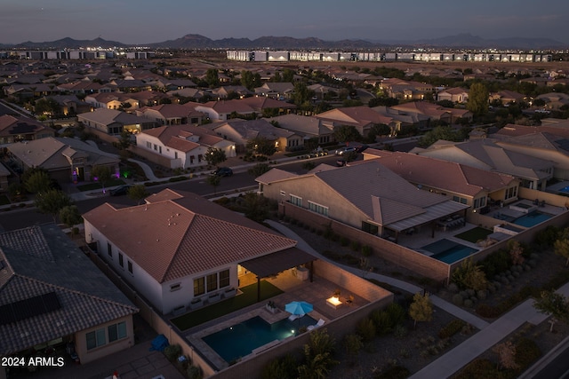 aerial view at dusk with a mountain view