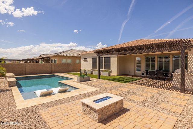 view of pool featuring a fenced in pool, a patio, a pergola, a fenced backyard, and an outdoor fire pit