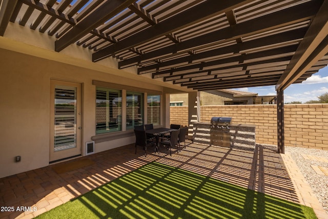 view of patio / terrace featuring fence, outdoor dining area, area for grilling, and a pergola