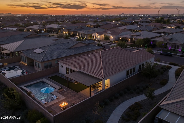 aerial view at dusk with a residential view