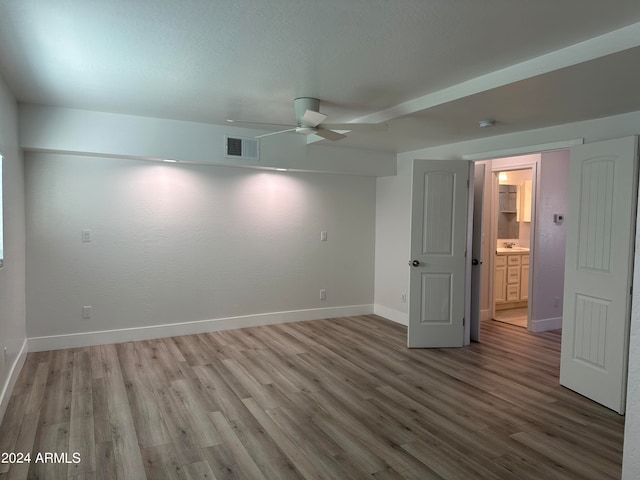 interior space featuring ceiling fan and wood-type flooring