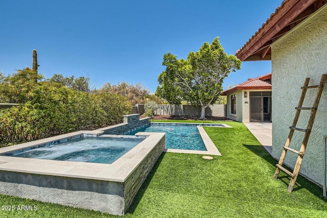 view of swimming pool featuring a yard and an in ground hot tub