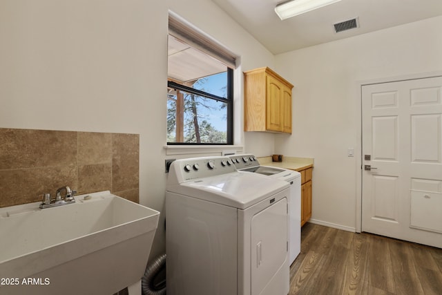 502 W Locust Rd, Payson, AZ 85541 - laundry area featuring cabinet space, washer and clothes dryer, and dark wood-style floors