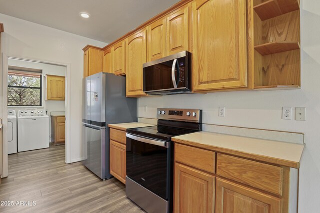 502 W Locust Rd, Payson, AZ 85541 - kitchen with stainless steel appliances, washing machine and dryer, open shelves, light countertops, and recessed lighting