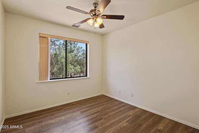 502 W Locust Rd, Payson, AZ 85541 - spare room featuring dark wood-style flooring, baseboards, and ceiling fan