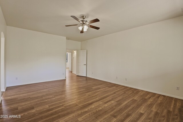 502 W Locust Rd, Payson, AZ 85541 - spare room with wood finished floors, a ceiling fan, and baseboards