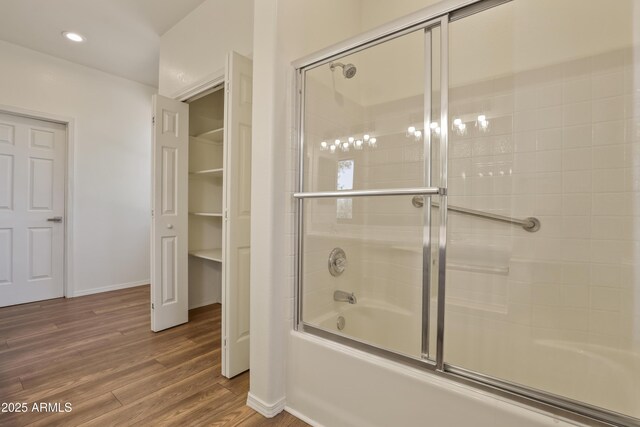 502 W Locust Rd, Payson, AZ 85541 - bathroom featuring bath / shower combo with glass door, wood finished floors, baseboards, and recessed lighting