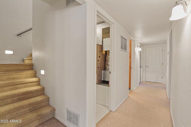502 W Locust Rd, Payson, AZ 85541 - hallway with light colored carpet, baseboards, and stairs