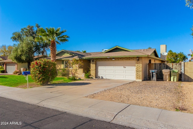 single story home featuring a garage