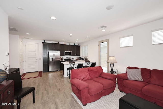 living room featuring light hardwood / wood-style floors