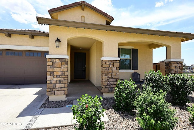 property entrance featuring a garage