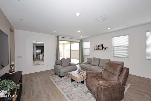 living room featuring light wood-type flooring