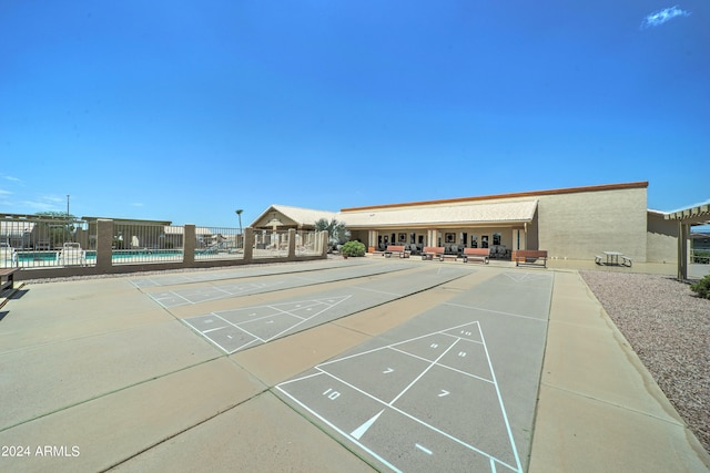 view of property's community featuring a pool