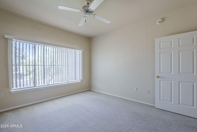 3236 E Chandler Blvd Unit 2003, Phoenix, AZ 85048 - spare room featuring carpet floors, a ceiling fan, and baseboards