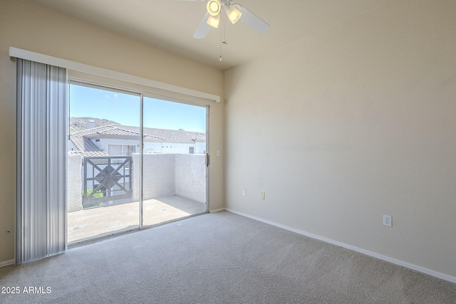 3236 E Chandler Blvd Unit 2003, Phoenix, AZ 85048 - carpeted empty room with baseboards and a ceiling fan