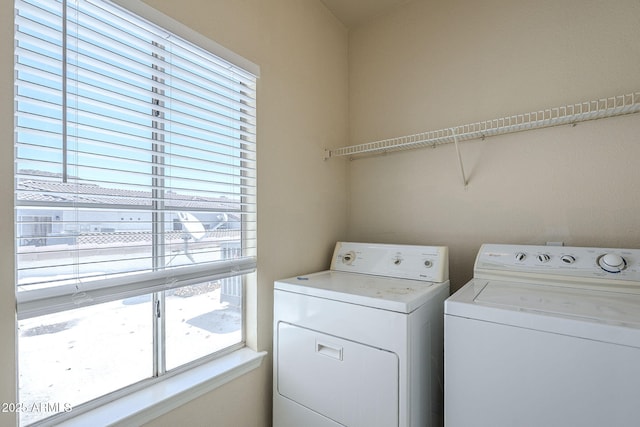 3236 E Chandler Blvd Unit 2003, Phoenix, AZ 85048 - clothes washing area with washer and clothes dryer