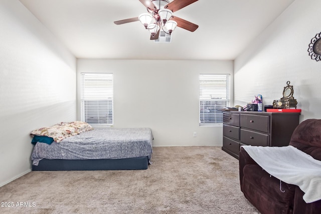 1619 E Aspen Ave, Buckeye, AZ 85326 - carpeted bedroom with multiple windows and a ceiling fan