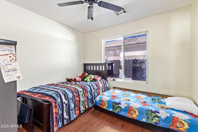 1619 E Aspen Ave, Buckeye, AZ 85326 - bedroom featuring wood finished floors and ceiling fan