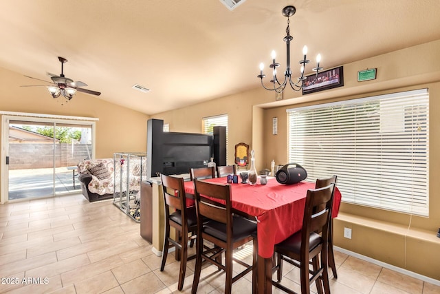 1619 E Aspen Ave, Buckeye, AZ 85326 - dining space with vaulted ceiling, a chandelier, light tile patterned floors, and a ceiling fan