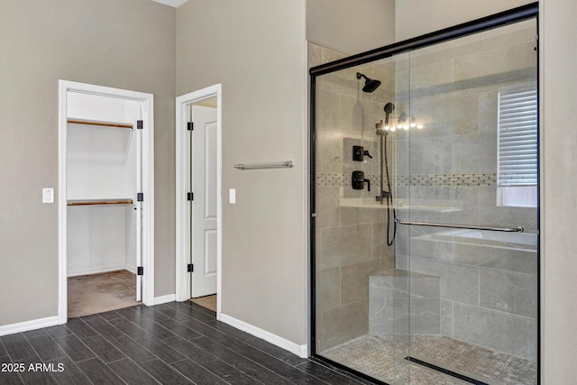 bathroom with a shower with shower door