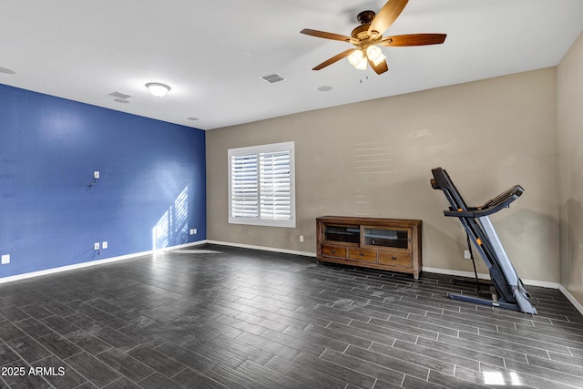 exercise room with ceiling fan