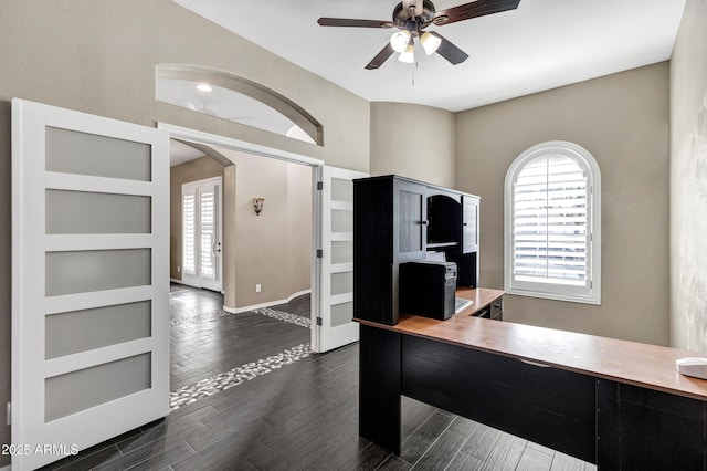 office area featuring ceiling fan, plenty of natural light, and dark hardwood / wood-style floors