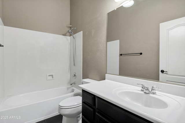 full bathroom with vanity,  shower combination, and toilet