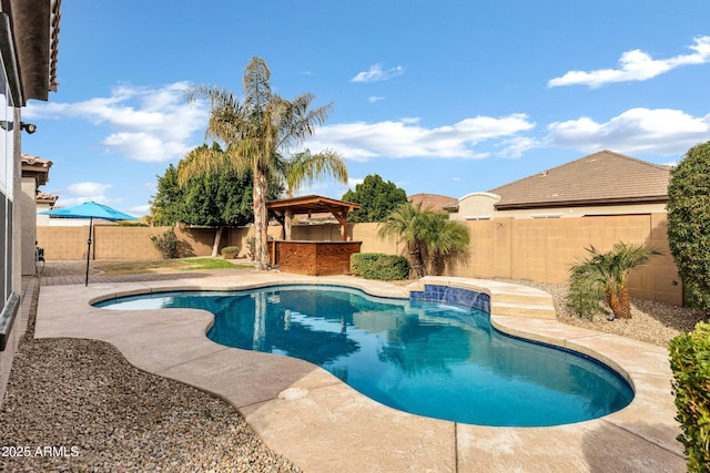 view of swimming pool featuring a gazebo, pool water feature, and a patio area