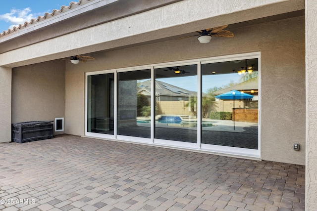 view of patio / terrace with ceiling fan