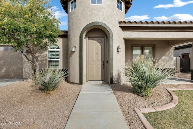 property entrance with a garage