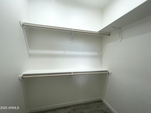 1825 Via Nueva Zelandia, Rio Rico, AZ 85648 - walk in closet featuring wood finished floors