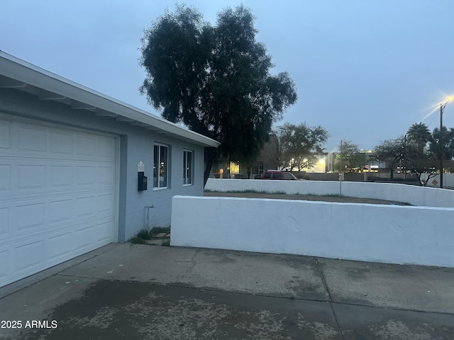 exterior space with a garage