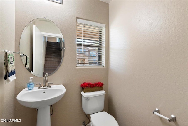 bathroom with sink and toilet