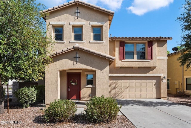 view of front of home with a garage