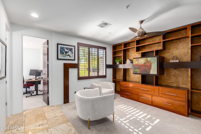 living room featuring ceiling fan