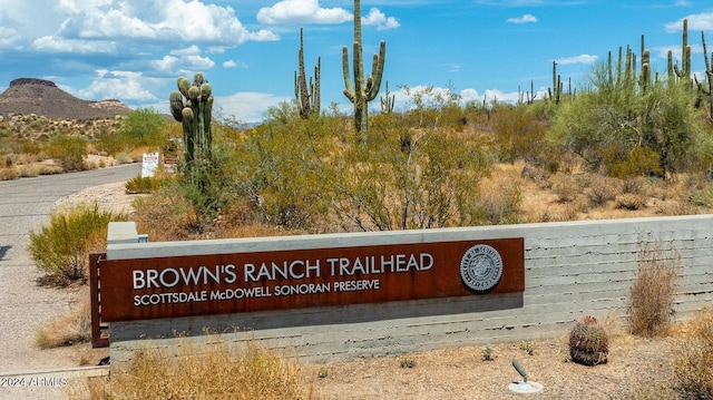 community sign featuring a mountain view