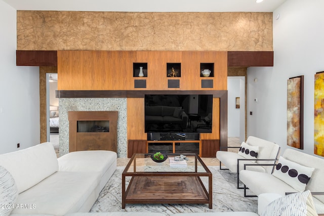 living room featuring a high ceiling