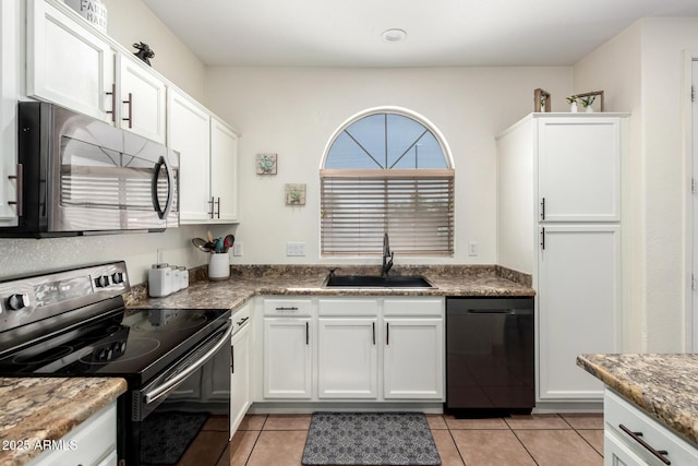6505 S 15th Dr, Phoenix, AZ 85041 - kitchen featuring range with electric stovetop, a sink, dishwasher, and white cabinetry